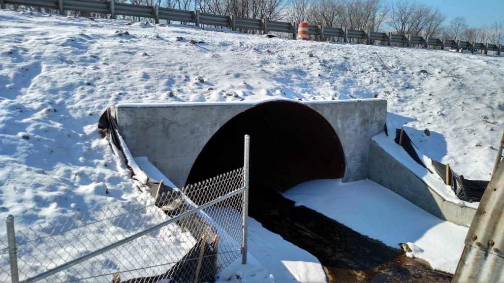 Culvert liner with headwall