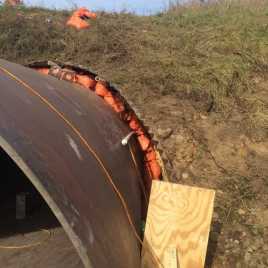 SEALING THE END OF THE ANNULUS FOR GROUTING