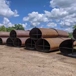 Fully stocked InfraSteel supply yard with different size elliptical liners