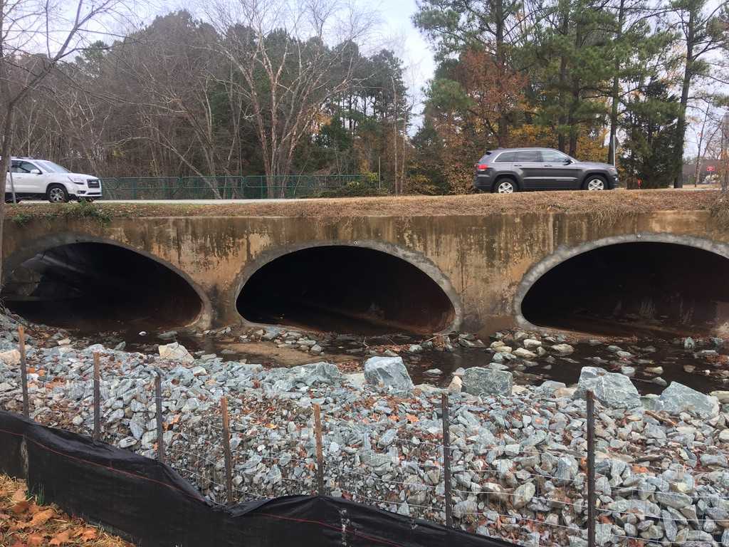 Three culverts with cars passing over